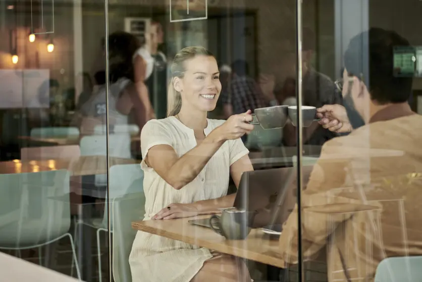 Two people having a coffee, enjoying the moment.